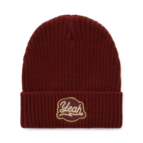 Klasszikus, bordázott, akril mandzsettás kötött sapka.